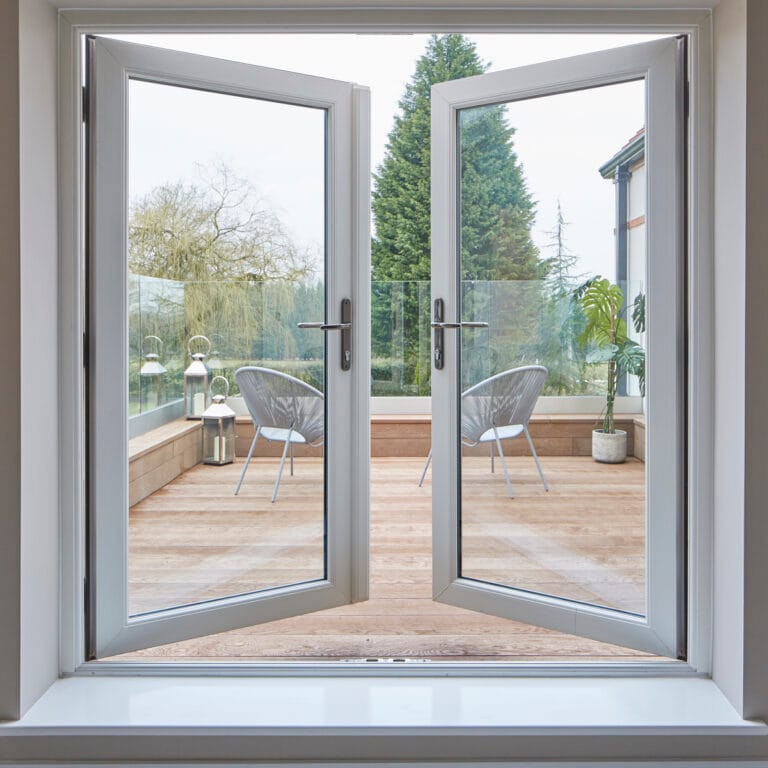 Open French doors leading onto a patio