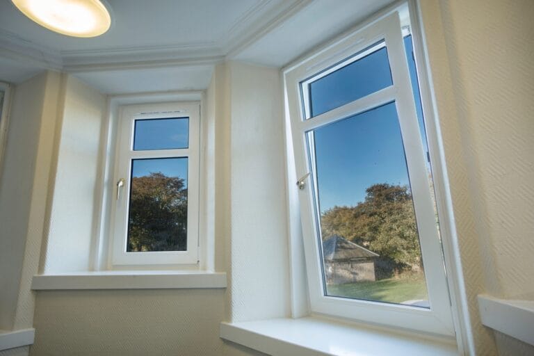 Tilt and turn window opened inwards in a bright room